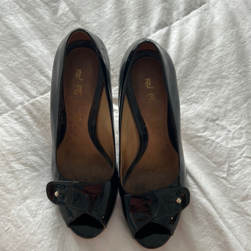 L.A.M.B. black patent leather pumps